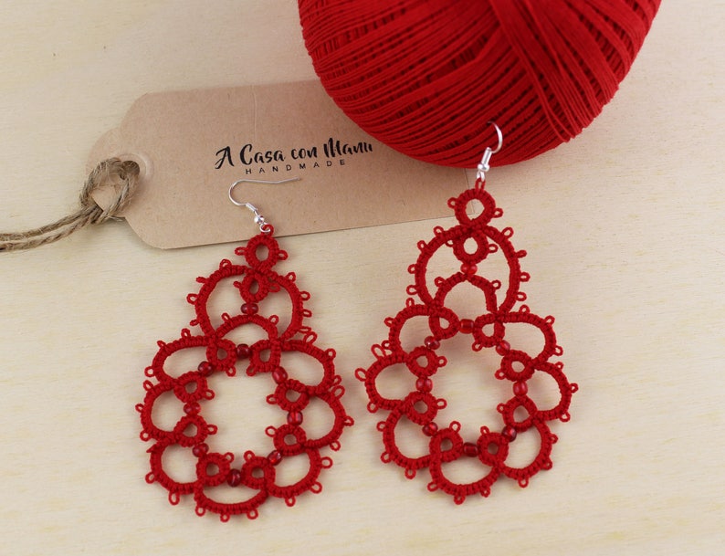 Red earrings in cotton and beads