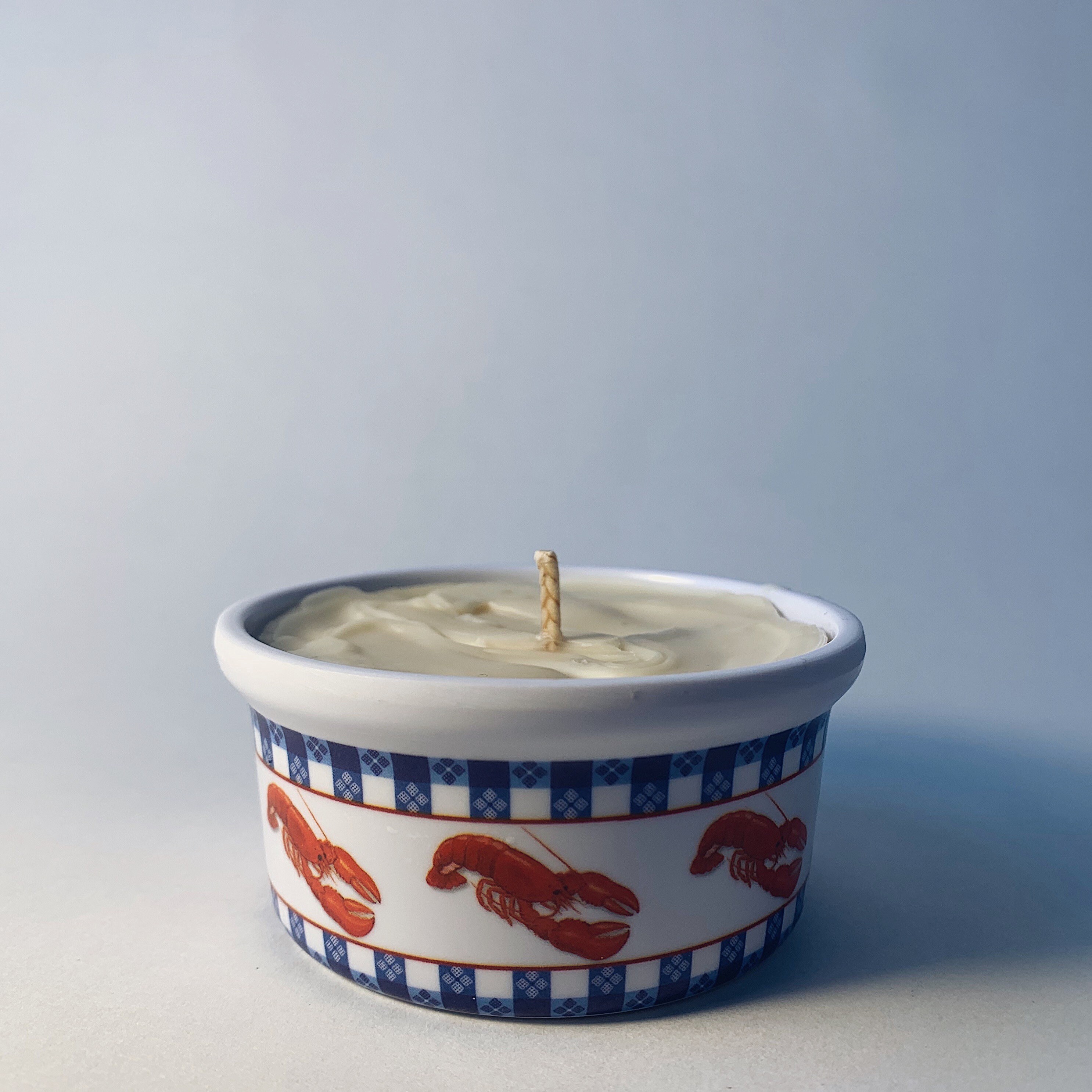 Aesthetically flawed handmade surf wax candle in repurposed Etsy