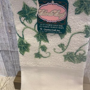 IVY: Charles Craft 
Cross Stitch Kitchen Towel
White and Green
100% Cotton

Smoke Free and Corgi Friendly Home