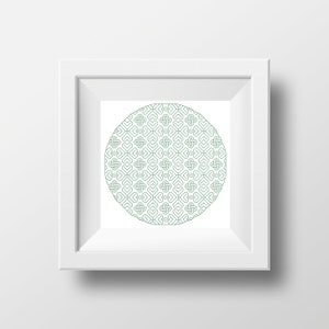 May include: A white frame containing a green and white geometric pattern. The pattern is a circle with a repeating design of hearts and crosses.
