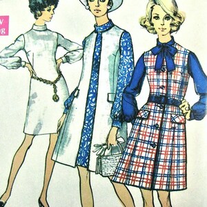 May include: A vintage sewing pattern illustration featuring three distinct dress styles: a solid light-colored mini dress with a chain belt, a sleeveless coat dress with blue patterned sleeves, and a plaid dress with a blue bow and matching belt.