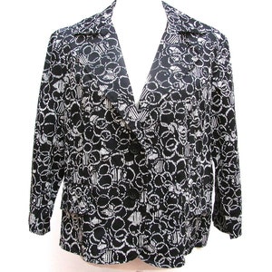May include: Black and white patterned blazer with a notched collar and three black buttons. The blazer features a repeating circular and linear design. The sleeves are three-quarter length. The blazer has two front pockets.
