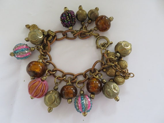 Brass charm best sale bracelet