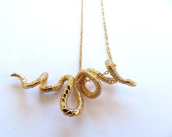 Colgante de serpiente de oro