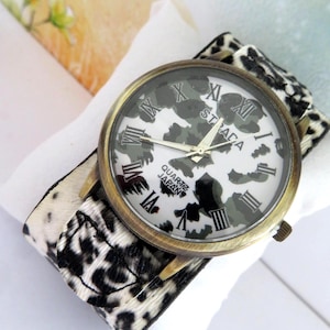 Superb Ladies Quartz Watch- Strada-made in Japan-bronze surround-Roman numbers-Analogue-battery-leather strap-Animal pattern all over-gift