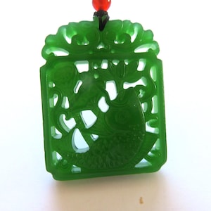 Pendant- Jade -!00% genuine Green Jade-Lucky Amulet-Lucky fish-2 ins by  1.5 ins-gift-cord