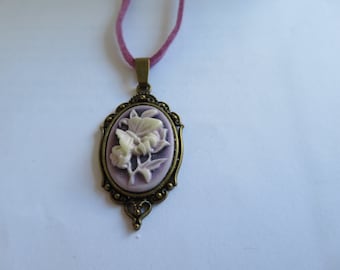 Pendant-Cameo-Oval vintage Victorian Butterfly pendant-filigree bronze plate-purple suede necklace-cream Butterfly -purple  background