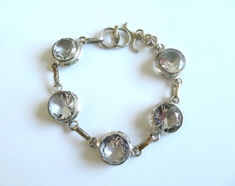 Pulsera de eslabones de plata con topacio