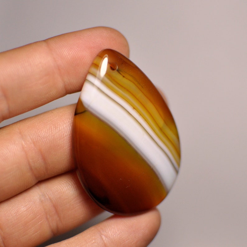 110.50 Cts. Natural Striped Agate Pendant Gemstone Pear Shape Brown White Color 56x36x6 mm