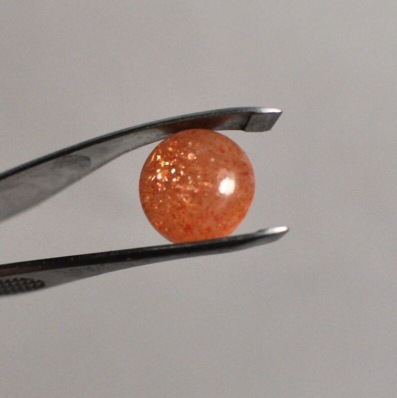 12x4.5 mm Natural Sunstone Cabochon Gemstone Orange color Round shape Ring size 4.55 Cts.