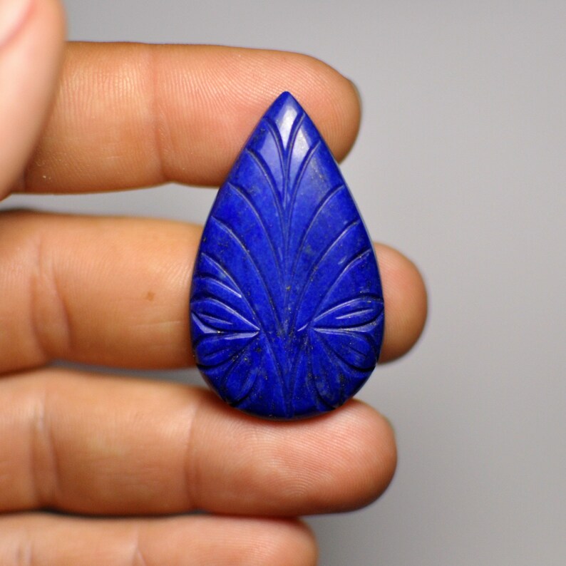 Natural Carved Blue Lais Lazuli Adornment Pear Cabochon Glorious Gemstone Pendant size 40x24x5 mm 47.45 Cts.
