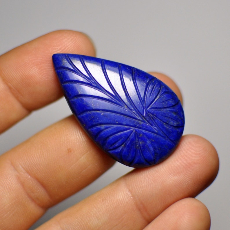 Natural Carved Blue Lais Lazuli Adornment Pear Cabochon Glorious Gemstone Pendant size 40x24x5 mm 47.45 Cts.
