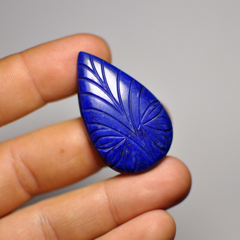Natural Carved Blue Lais Lazuli Adornment Pear Cabochon Glorious Gemstone Pendant size 40x24x5 mm 47.45 Cts.