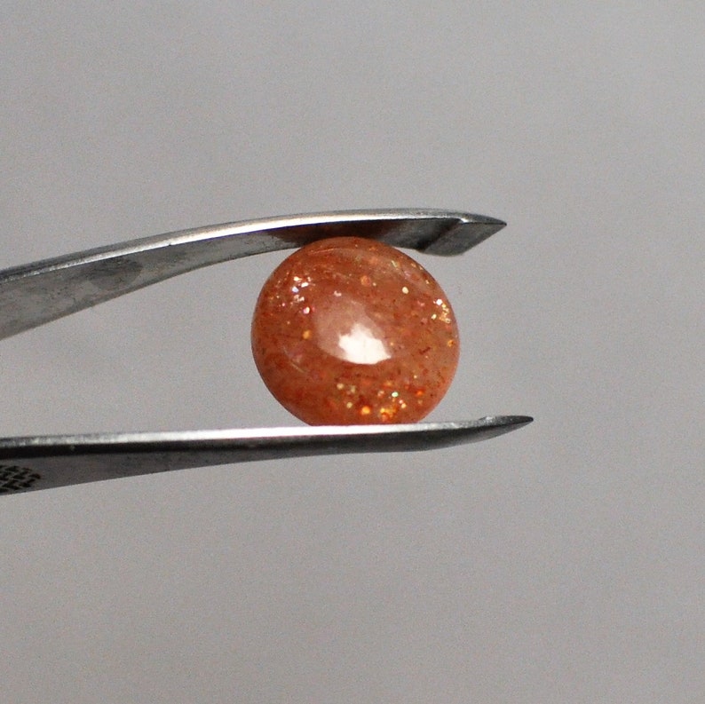 12x4.5 mm Natural Sunstone Cabochon Gemstone Orange color Round shape Ring size 4.55 Cts.