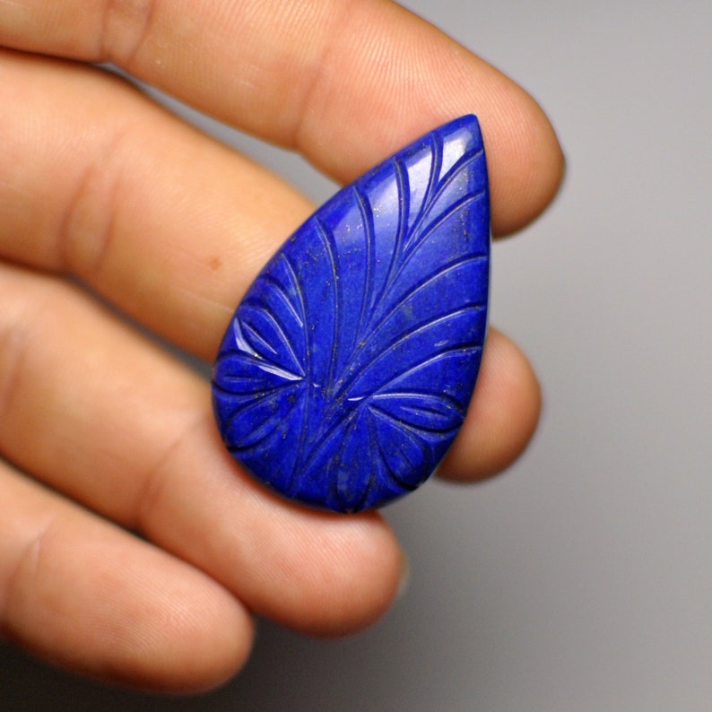 Natural Carved Blue Lais Lazuli Adornment Pear Cabochon Glorious Gemstone Pendant size 40x24x5 mm 47.45 Cts.