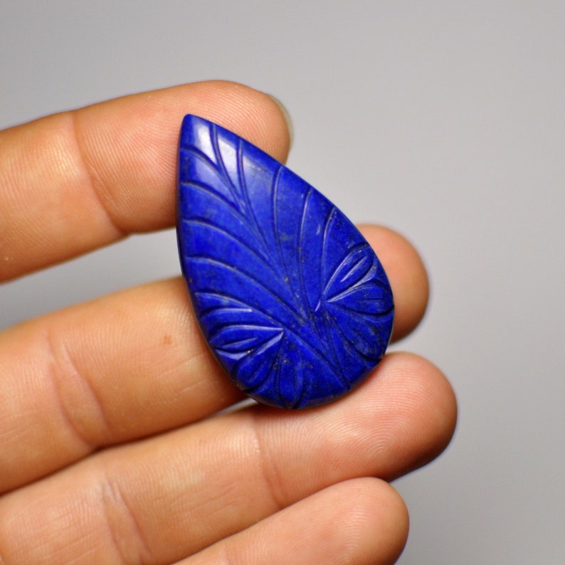 Natural Carved Blue Lais Lazuli Adornment Pear Cabochon Glorious Gemstone Pendant size 40x24x5 mm 47.45 Cts.