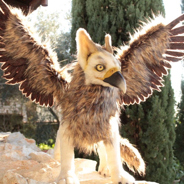 Griffin, magic creature, fantasy animal poseable art doll. Realistic toy animal with wings