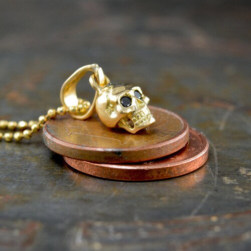 18k Gold Tiny Skull Pendant With 