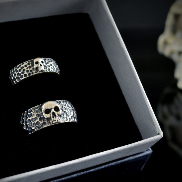 Set of handmade skull alliances in sterling silver and hammered textures