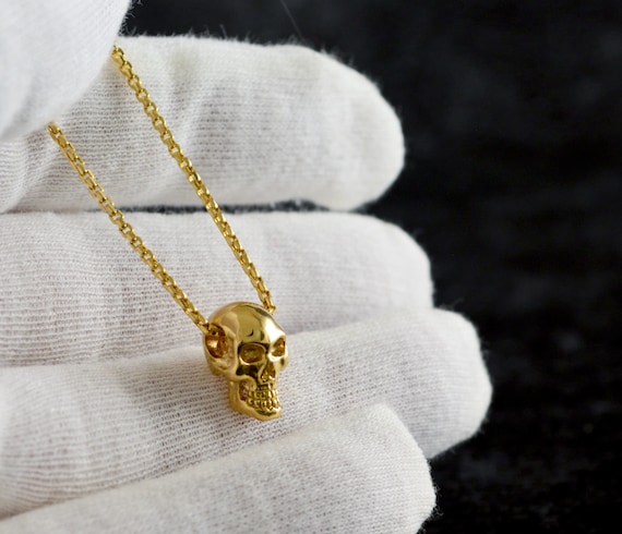 Skull gold pendant deals