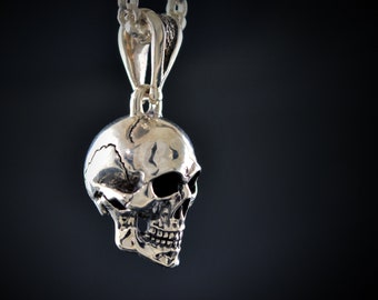 Silver human skull pendant with oxidized textures, Memento mori pendant