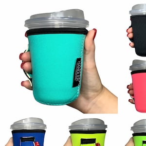 May include: Set of six colorful neoprene cup holders with a handle. Each holder features the word "HANDLER" printed on the side.