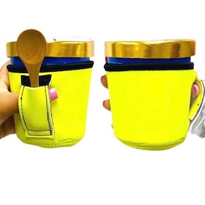 May include: Two yellow insulated cups with black trim and a spoon holder. The cups are designed to hold ice cream containers.