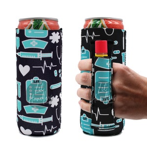 May include: A black and teal can cooler with a medical theme. The cooler has a variety of medical symbols, including a stethoscope, a syringe, a heart rate monitor, and a first aid kit. The cooler also has the text "Lit Handles" on it. The cooler has a built-in handle and a slot for a lip balm.