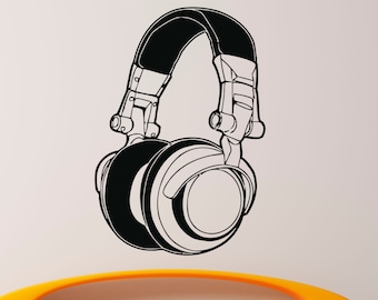 May include: Black and white illustration of a pair of headphones on a white wall. The headphones are large and have a detailed design. The headphones are above a yellow couch.