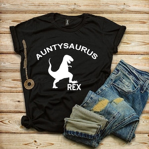 May include: Black t-shirt with a white dinosaur graphic and the text "Auntyosaurus Rex".