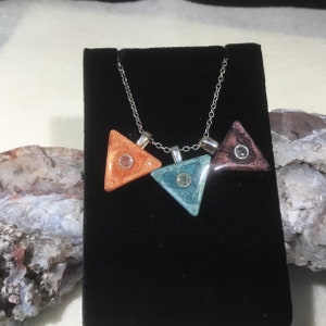 Sapphire shimmer resin pendant (each sold separately)