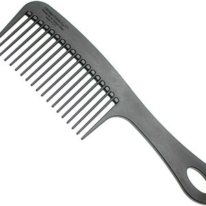 May include: A black wide-tooth comb with a long handle. The comb has a rounded edge and a hole in the handle. The text "Chicago Comb Co. - Made in the USA" is printed on the handle.