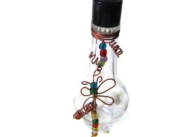 Small bottle with copper wire work and beads