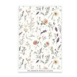 May include: A white background with a floral pattern featuring roses, daisies, and lavender sprigs in shades of pink, purple, and green. The text "PLANNER PRESS SC019" is printed at the bottom.