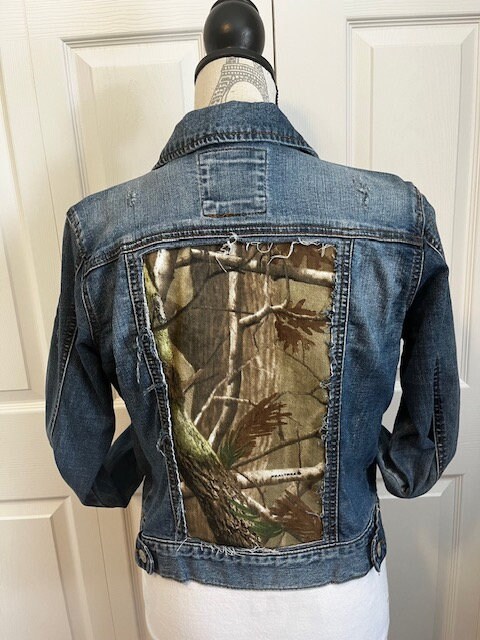 Denim jacket with camo sleeves hot sale