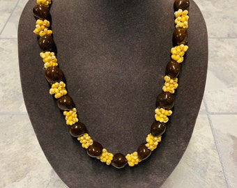 Hawaii Brown Kukui Nut Lei With Yellow Color Shells