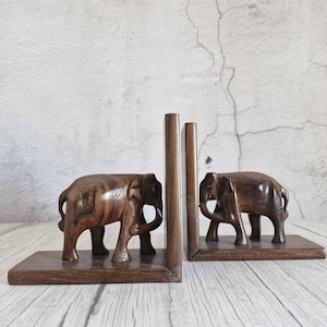 Juego de 2 sujetalibros de elefante: esculturas de animales de madera tallada a mano, sujetalibros vintage de madera oscura, soportes decorativos para estanterías con motivos de safari.