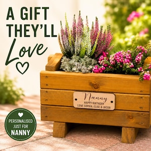 May include: A wooden planter box with vibrant flowers and foliage. A wooden plaque on the front reads "Nanny" and "Happy Birthday." The image also includes the text "A Gift They'll Love" and "Personalised Just for Nanny."