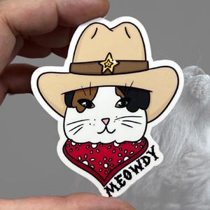 Meowdy glänzender Vinyl wasserfester Aufkleber | Hochwertige Kunst Einzigartige Katze Cowboy Cowboy Cowgirl Hut Bandana Punny Cute Red Howdy Western