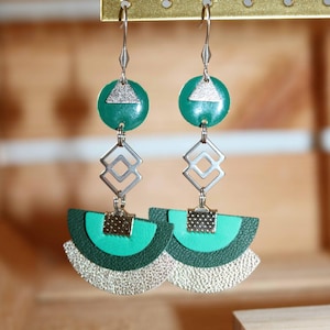 Asymmetrical dangling earrings