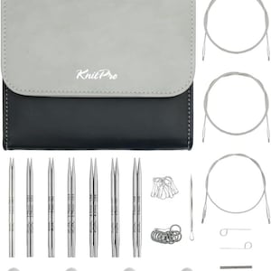 May include: A knitting needle set with a grey and black case, needles, cables, stitch markers, and accessories. The case is labelled "KnitPro". The needles are silver and have size markings. Includes various knitting tools for crafting.