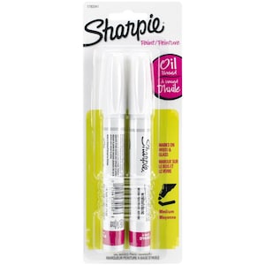 Könnte beinhalten: Zwei weiße Sharpie Öl-basierte Malmarker in einer gelben und weißen Verpackung. Die Verpackung trägt die Aufschrift "Ölbasiert" und "Markierungen auf Holz & Glas".