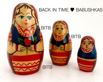Red & Blue Belarusian BelarusVintage Nesting Doll Holding Single Red Flower. Miniature Brest Region Babushka Dolls, Matryoshka Dolls.