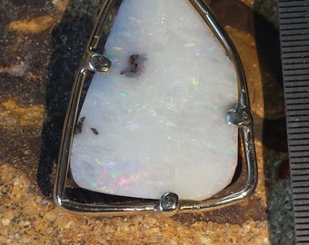 Australian boulder opal pendant set in sterling silver