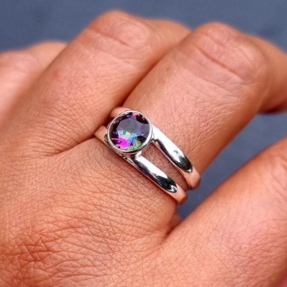 Sterling Silver Amethyst, Blue Topaz, Opal & Peridot Textured 4 Band Ring Set Sterling Silver Amethyst, Blue Topaz, Opal & Peridot Textured 4 Band Ring Set
