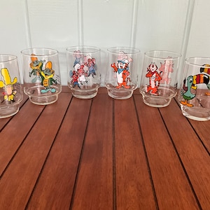 One 1977 Kellogg’s Collector Series Glasses, Cereal Characters - Big Yella, Dig ‘em, Snap Crackle Pop, Tony Jr., Tony Sr., Toucan Sam
