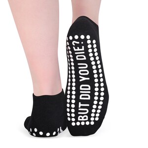 May include: Black ankle socks with white grip dots on the bottom and the text "BUT DID YOU DIE?" printed on the back of the sock.
