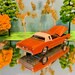 Voiture Miniature Cadillac Eldorado 1975 Dorée - Auto World 1/64 - Édition Limitée Land Yachts
