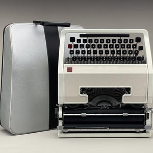 Pre-order Olivetti Lettera DL SPECIAL EDITION working portable typewriter in Excellent condition New faux leather cover New Ribbon Qwerty