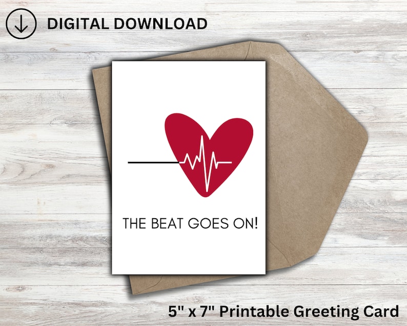 May include: Printable greeting card with a red heart and a white heartbeat line. The text "THE BEAT GOES ON!" is printed below the heart. The card is 5 inches by 7 inches.